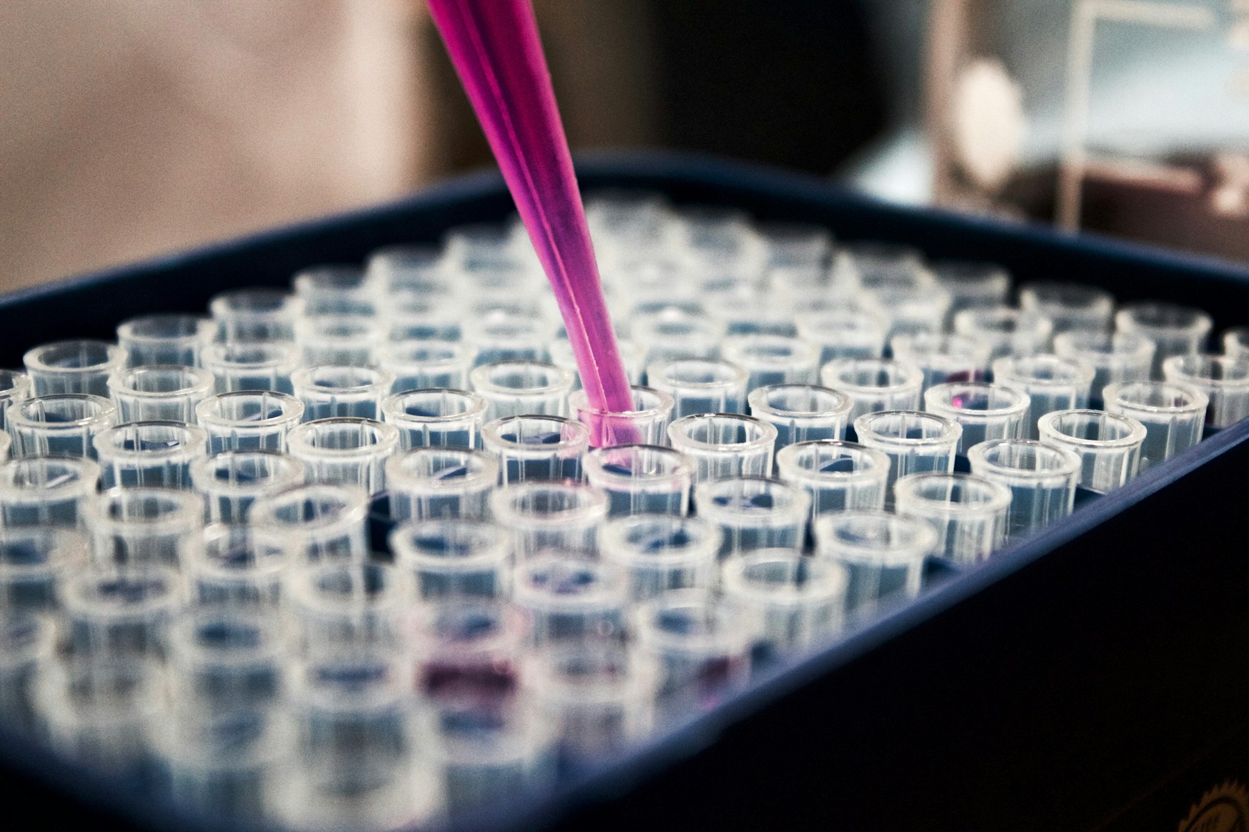 Conceptual Micro-immunotherapy composition with a pipette and multiple test tubes